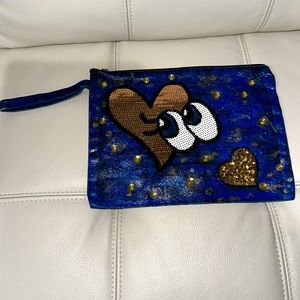 Clutch painted handbag